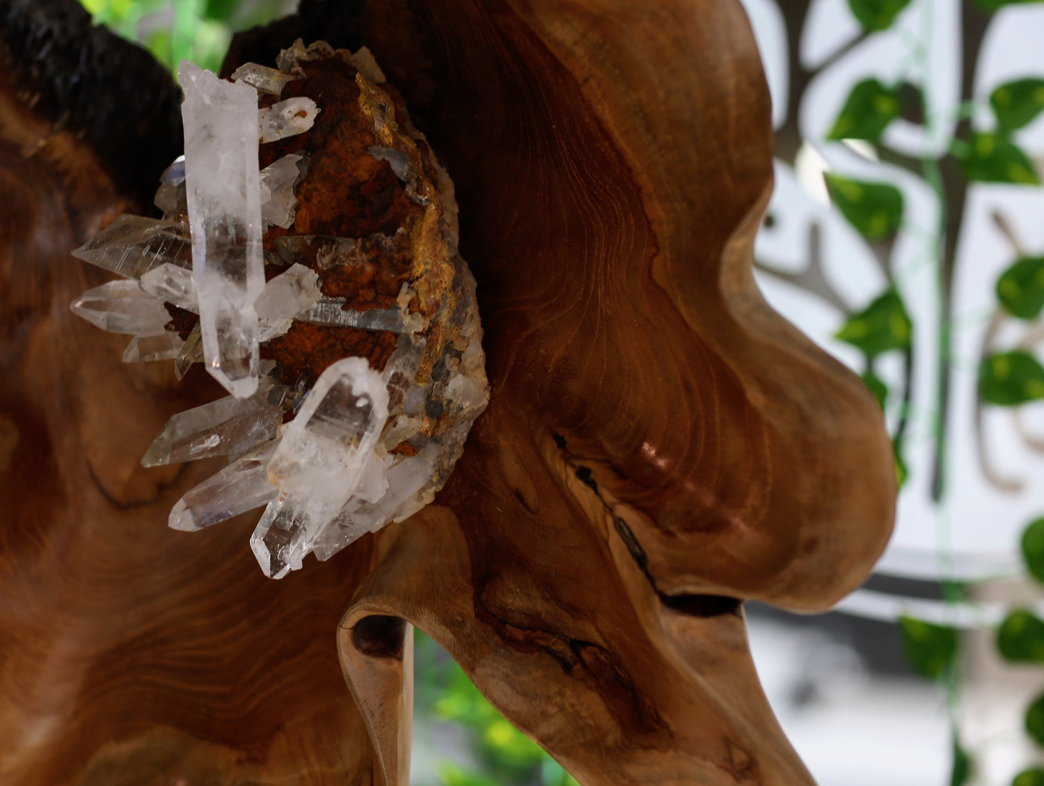 Up close of wooden sculpture with crystals
