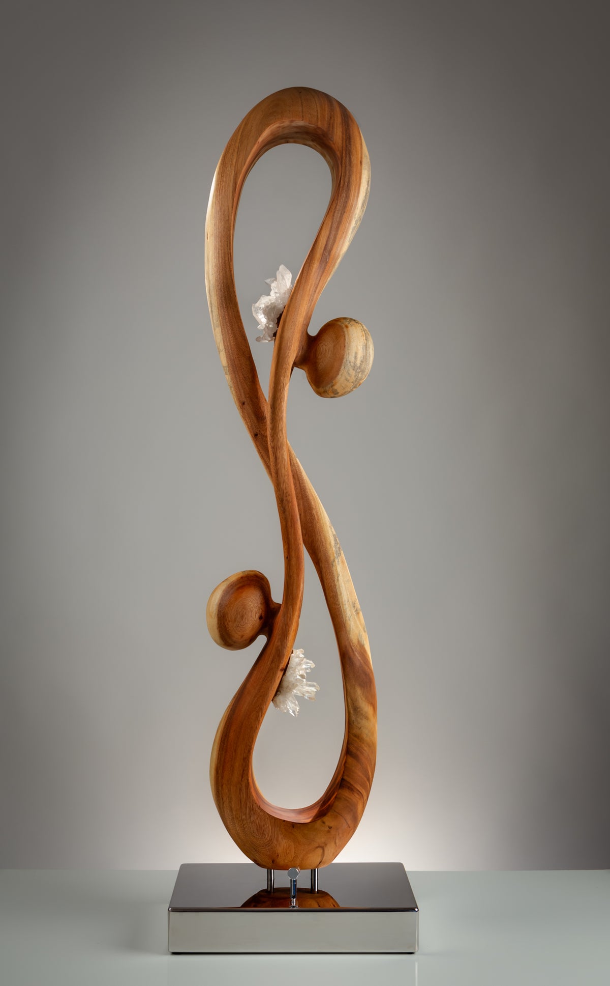 Dorit Schwartz – Heart to Heart II, original sculpture in quartz crystal, found wood and high-polish stainless steel base