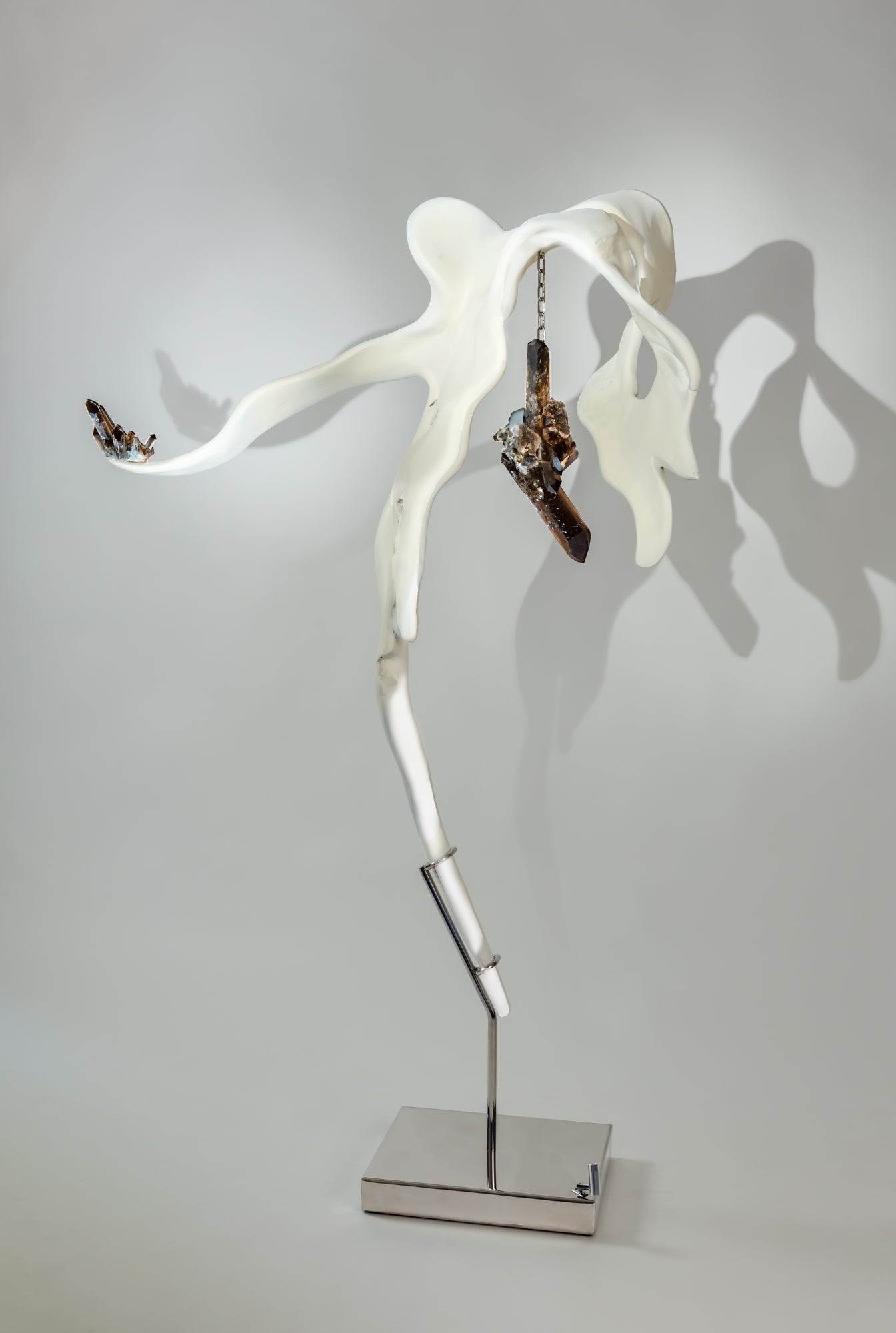 Dorit Schwartz, 69x42x16 in Smoky quartz, resin, high polish stainless steel base, light