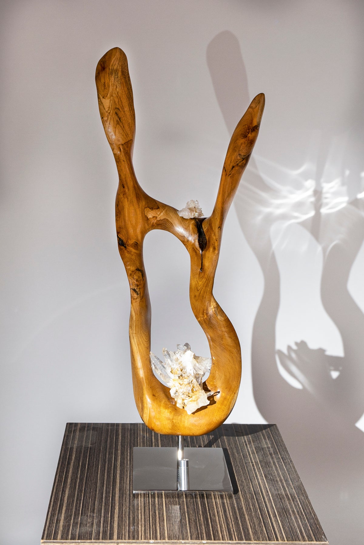 Dorit Schwartz – Graceful Touch, original sculpture in Lemurian quartz crystal and mahoni wood