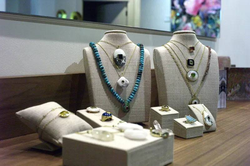 Gemstone necklaces and rings on display at GAIA Sun Valley